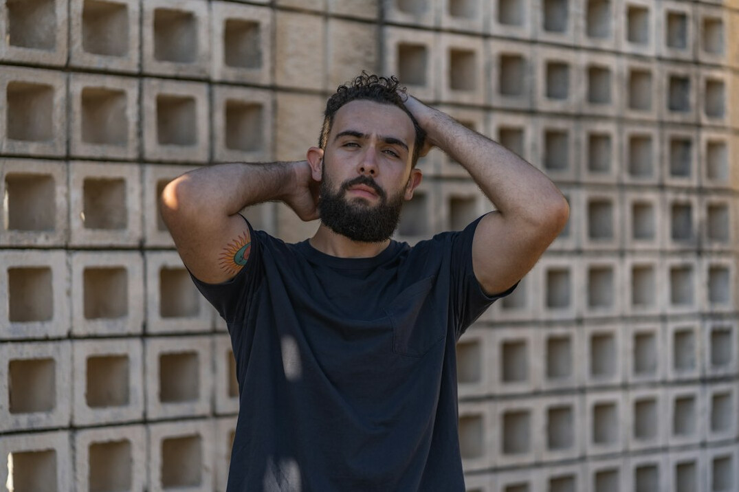 Portrait of a bearded man with a calm expression