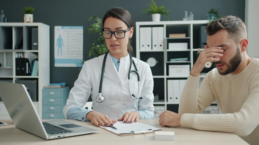 person comparing health insurance options
