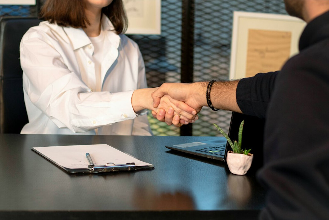 person talking to doctor in office