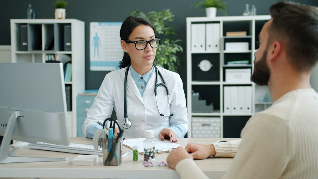 patient talking to doctor